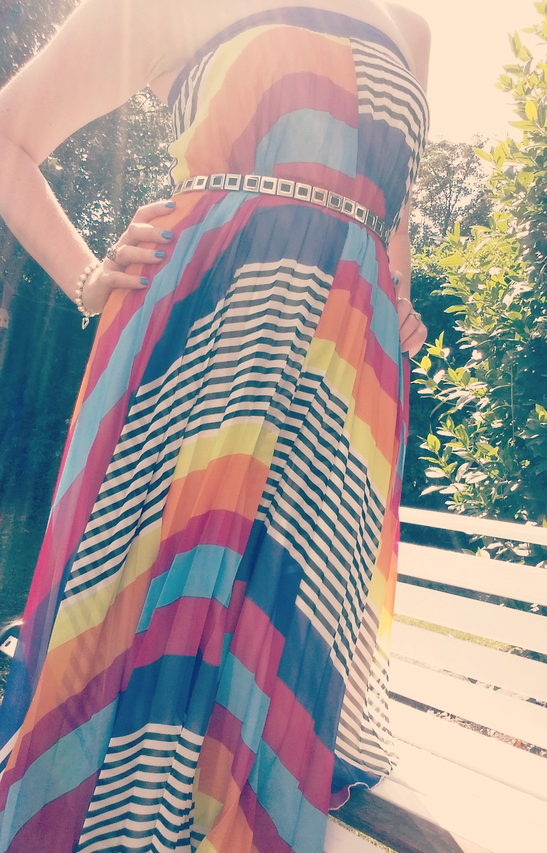Searching for pots of gold in a vibrant rainbow dress